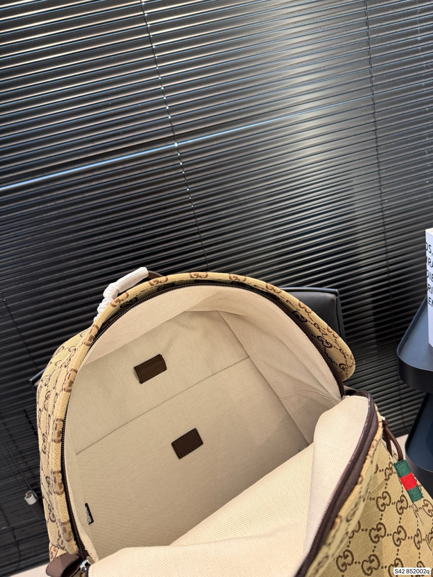 GG MONOGRAM BACKPACK